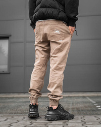 SPODNIE Newbadline CHINO JOGGER  ICON BEIGE